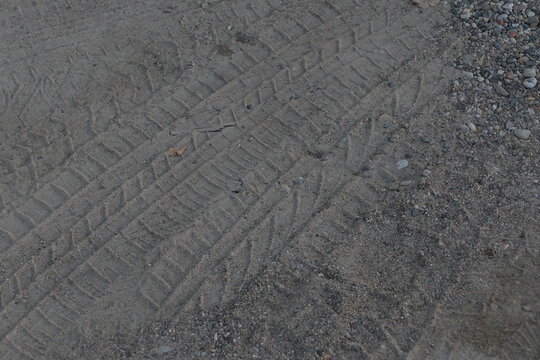 tyre tracks in the dust