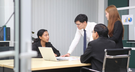 Business People, Successful business professionals. Diverse team celebrating business success at meeting.