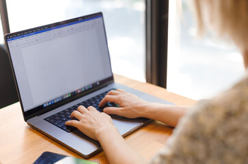 Girl typing notes on laptop, space for copy, hands close-up. Woman working in office, businesswoman, female student studying at university, typing text on laptop, female hands