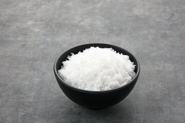 Grated coconut (kelapa parut) on bowl, food preparation
