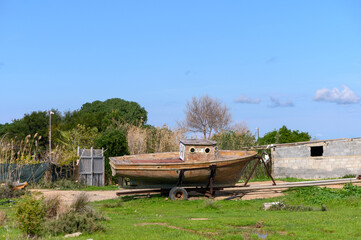 Fototapeta na wymiar old fishing boat in a village in Cyprus 1