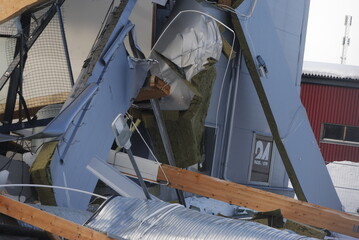 Collapsed house on a cold wintry day.