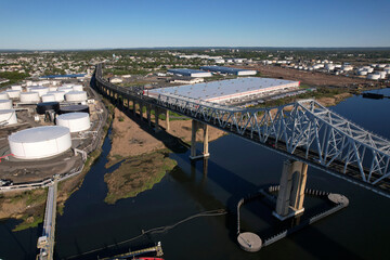 Aerial view of New Jersey approach to Outerbridge Crossing with tank fields in Perth Amboy, New...