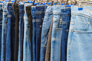 White black blue jeans in the market, sale concept background, retail, marketing and merchandising concept background - 745458241