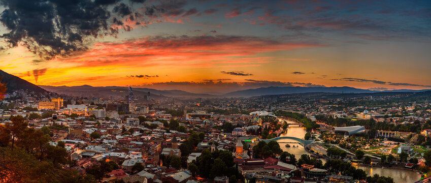 Fototapeta Beautiful view of Tbilisi at sunset, capital of Georgia. Citiyscape