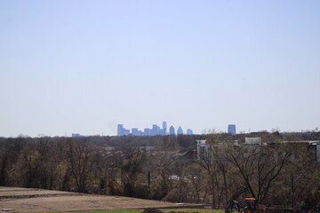 View of Downtown Dallas from White Rock Trail looking southwest.The skyline is about 8 miles in distance.