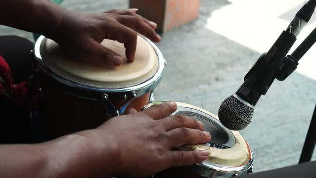 musician's hands playing Ketipung Dangdut