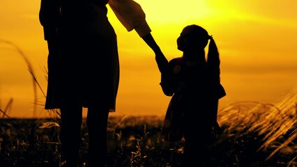 Happy family travel, mama. Silhouette. Mom Kid daughter, hold hands in sun, Happy family, teamwork....