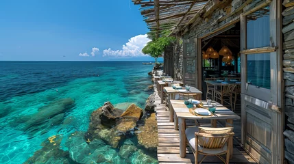 Cercles muraux Bora Bora, Polynésie française restaurant by the ocean on a sunny dayof a tropical Island, a tropical cafe with an ocean view, a Restaurant over the sea