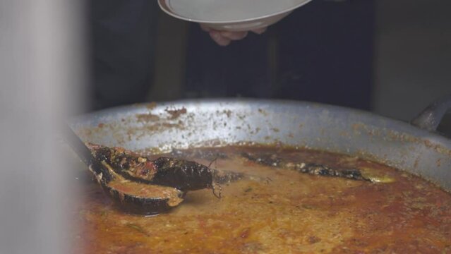 Cooking Indonesia Indonesian Traditional Food Culinary in Yogyakarta Java - Dazed catfish Mangut Lele , Chicken , Intestines , Lungs in a Kitchen