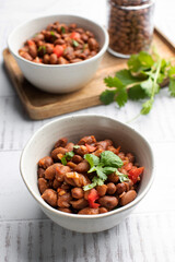  Vegetarian dish of stewed pink beans and tomatoes. A delicious bean dish served 