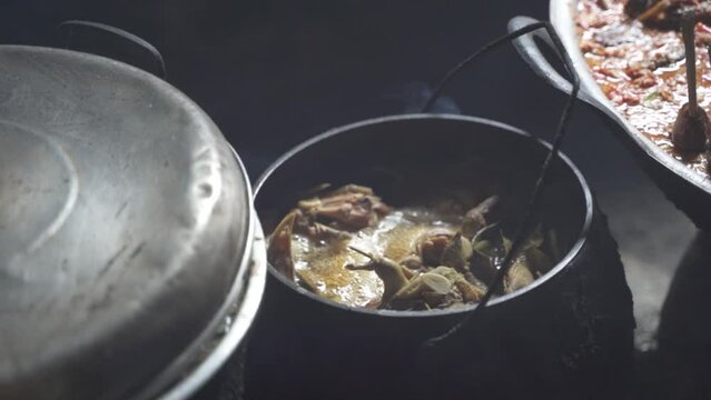 Cooking Indonesia Indonesian Traditional Food Culinary in Yogyakarta Java - Dazed catfish Mangut Lele , Chicken , Intestines , Lungs in a Kitchen
