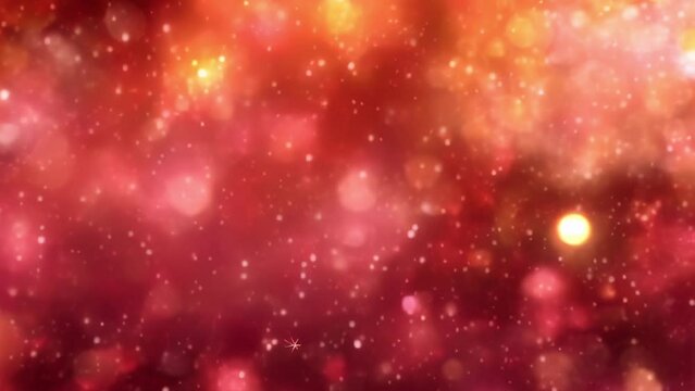 Abstract background in red and orange colors with blurred lights or dots. High quality 4k footage