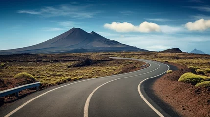 Poster Image related to unexplored road journeys and adventures.Road through the scenic landscape to the destination in Lanzarote natural park © Wajid