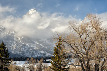 The Grand Teton poking through the clouds; Grand Teton NP; Wyoming 