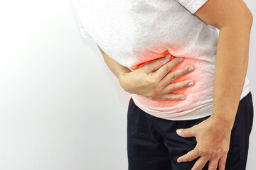 Asian woman suffering from stomachache. Chronic gastritis, menstruation and health concept.