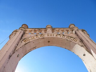 ancient colonial arch in Jalisco, Mexico against the sky
