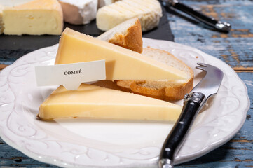French cheese Comte, three varieties 1 year matured Prestige, fruity flavoured Fruite and Vieille...