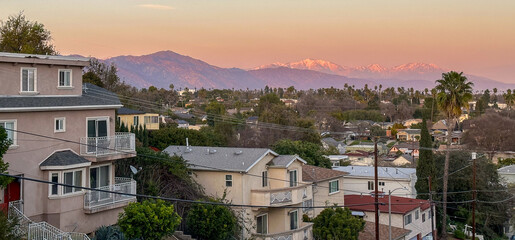 Los Angeles - San Gabriel Mountains and Valley at sunet, snowtop mountainside and landscape