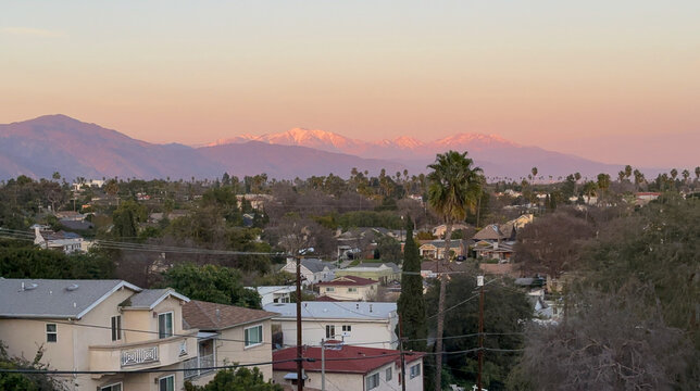 Los Angeles - San Gabriel Mountains and Valley at sunet, snowtop mountainside and landscape