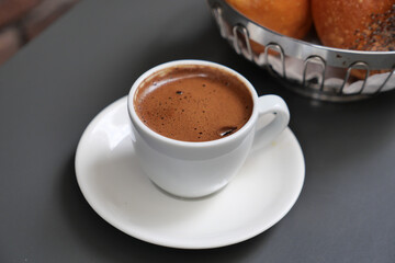a cup of turkish coffee on table 