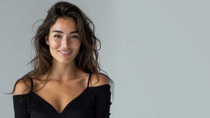Fototapeta premium Arab woman wearing black ribbed V-Neck Body smiling isolated on grey