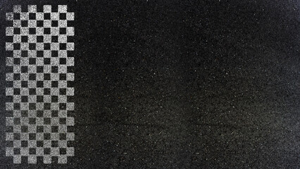 Damier noir et blanc sur asphalte 