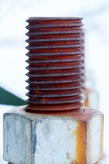 Rusty bolts in snow
