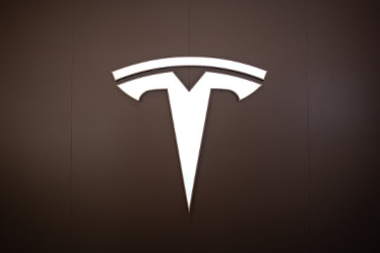 Bangkok, Thailand - Feb 2024: Tesla, the famous EV vehicle brand is opening new flagship showroom at Siam Paragon shopping mall, present and sale with Model 3 and Model Y.