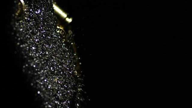 Vertical - 9mm Parabellum Cartridges Dropping Into Gunpowder Heap. slow motion shot