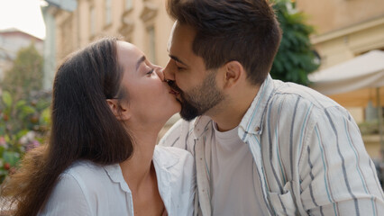 Boyfriend feeding girlfriend European couple lovers kissing sweet kiss love feelings relationship...