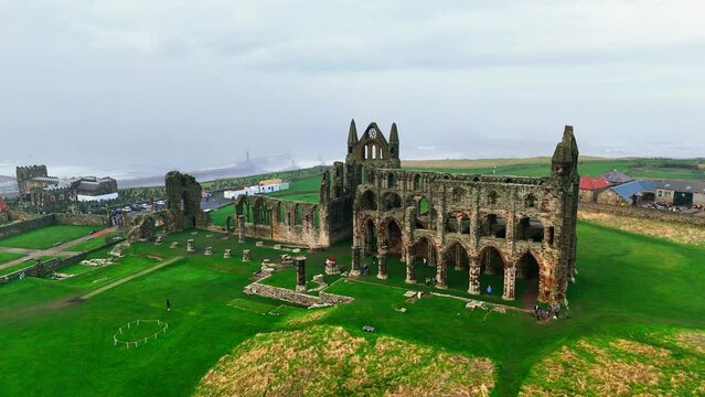 Whitby Abby now derelict and formally a Benedictine abbey and is situated overlooking the sea on the East coast of England