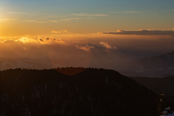 Beautiful sunrise at winter in Ceahlau Mountains, Romania