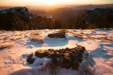 Beautiful sunrise at winter in Ceahlau Mountains, Romania