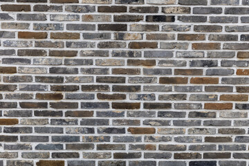 Obraz premium Pattern of brick wall for background and textured, Seamless brick wall background. Old Brick texture, Grunge brick wall background.