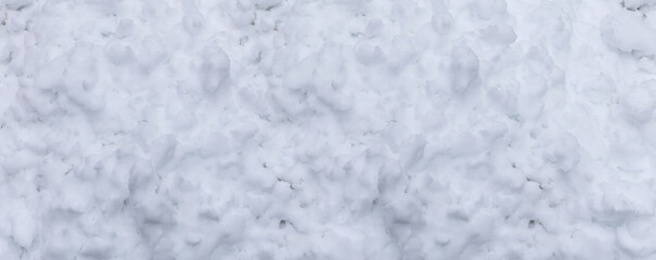 Winter snow. Snow texture Top view of the snow. Texture for design. Snowy white texture. Snowflakes.