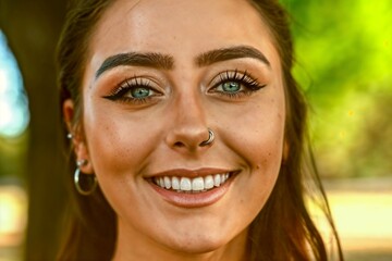Attractive young woman with a nose piercing