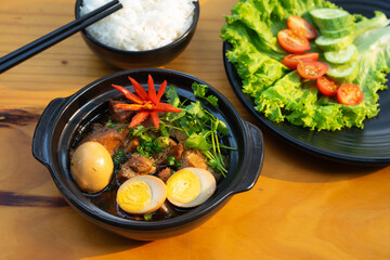 Viet nam specialty, braised meat with eggs rice