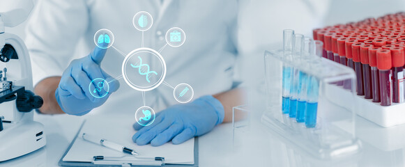 Person holding a glass of water in the laboratory, Scientist hands doing with blood samples or tests DNA, Medical innovation and medical health care icons in pharmaceutical lab.