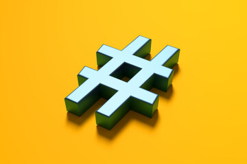 Obraz premium Metallic blue hashtag symbol on yellow background.
