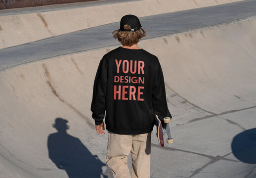 Mockup of skateboarder wearing customizable sweatshirt