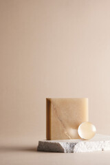 Pastel toned background with broken stones and natural objects.