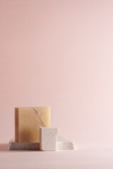 Pastel toned background with broken stones and natural objects.