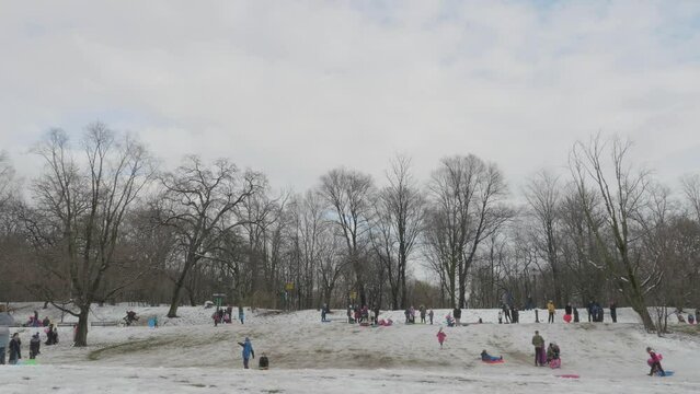 Kids sledding on a snow day