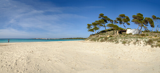 Es Carbo beach, lonely woman running on Virgin sand beach , Ses Salines, Mallorca, Balearic Islands, Spain