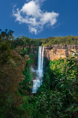 Beautiful flowing River in Fitzroy water Falls in Bowral NSW Australia beautiful colourful cloudy skies lovely waterfalls