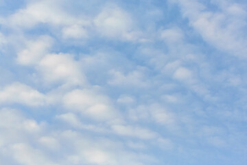 Blue sky background with tiny clouds. Atmosphere background or wallpaper