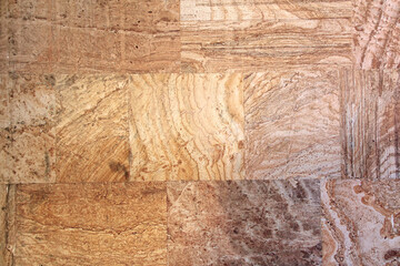 Close up texture of marble of yellow, brown and white color. Natural marble material. Marble tile floor texture