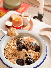 Healthy oatmeal with granola and mixed seeds for breakfast. Morning time. Fresh meal. Delicious food. Healthy recipes. Homemade food. Cooking recipes. Brunch. Clean food. Easy Granola bowl. 