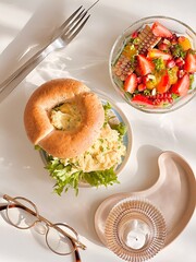 Scrambled eggs Bagel with mixed salads for breakfast. Morning time. Fresh meal. Delicious food. Scandinavian style. Homemade food. Cooking recipes. Brunch. Healthy recipes. Vegetable. Clean food. 
